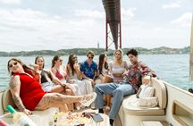 Wine tasting and sunset with snacks on a boat in Lisbon
