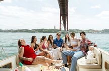 Wine tasting and sunset with snacks on a boat in Lisbon