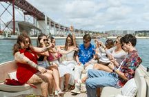 Wine tasting and sunset with snacks on a boat in Lisbon