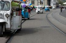Zurich 90-minute city tour by electric tuk tuk
