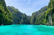 Sunrise Phi Phi cove collection with longtail boat from Krabi