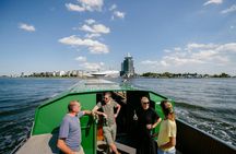 Unique Heineken boat canal cruise in Amsterdam with live guide