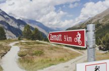 Zermatt full-day guided bike tour with mountain landscape views
