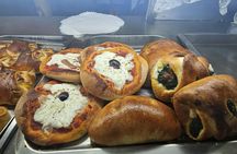 Catania walking tour with street food tasting from Taormina