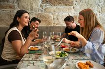 Food tour in Porto with visit to ancient Port Wine cellar