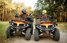 Snowmobile or quad ride and thermal pools day trip from Kraków