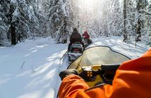 Snowmobile or quad ride and thermal pools day trip from Zakopane