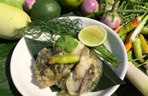 Lao cooking class on a Mekong River boat with market visit