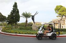 Self-drive electric car tour with pre-programmed GPS