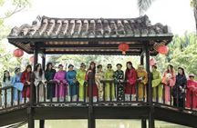 Ao Dai Museum guided tour with dress try-on, photos and tea break