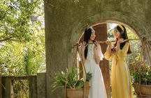 Ao Dai Museum guided tour with dress try-on, photos and tea break