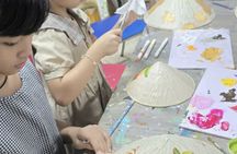 Nón Lá conical hat painting workshop in Ho Chi Minh City