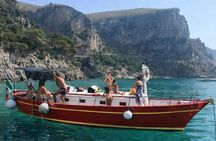 Gozzo boat tour in Naples with swimming stop and local tasting