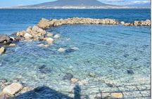Gozzo boat tour in Naples with swimming stop and local tasting