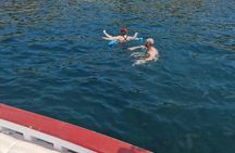 Gozzo boat tour in Naples with swimming stop and local tasting