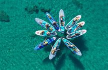 Small-group coastal SUP experience with sea caves and snorkelling