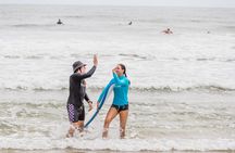 Surfing lesson for beginners at Broadbeach at Kurrawa Surf Club car park