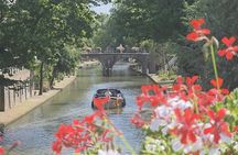 Utrecht canal cruise in open boat with drink and audio guide