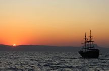 Volcanic islands sunset dinner cruise in Santorini