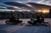 Snowmobile or quad ride and thermal pools day trip from Zakopane