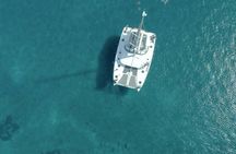 Santorini catamaran cruise with BBQ and drinks from Vlychada Marina