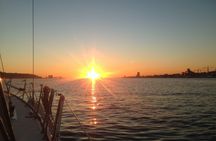 Sunset cruise along the Tagus River in Lisbon