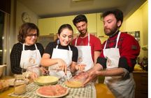 Market tour, cooking class and lunch or dinner at a Cesarina's home in Rome