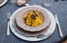 Market tour, lunch or dinner and show cooking at a Cesarina's home in Bologna