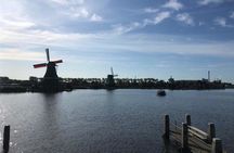 Sightseeing tour of windmills, cheese farm and Volendam with private transportation