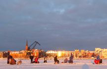 Guided ice fishing experience in Luleå