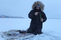 Guided ice fishing experience in Luleå