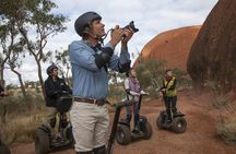 Quarter Uluru self-balancing scooter and sunset