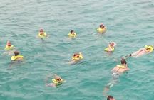 Parasailing Snorkeling and Glass Boat Adventure in Negril
