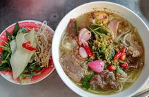Cooking class, market tour and basket boat tour