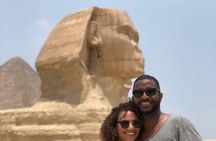 Day Tour to Giza pyramids sphinx Egyptian museum bazaar camel ride Nile cruise