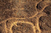 Private Goa tour of ancient rock art, laterite cave and bubble lake with lunch