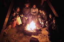 Snowshoe trip with a campfire in Tromso