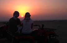 El Gouna Sunset Safari tour by Quad bike, Through The Dry Canyon, and Sand Dunes