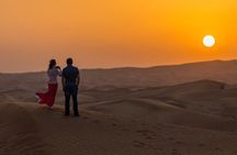 Dubai Desert Safari with Quad Bike, sandboarding, live show & BBQ