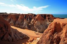 The colorful sands of Morro Branco beach - Full Day Tour