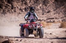 Quad biking in the road to the dam in Marrakech