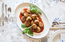 Dining experience at a local's home in Civitavecchia with show cooking