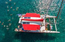 Sailing Catamaran Cruise in Santorini with BBQ, Drinks and Transfer