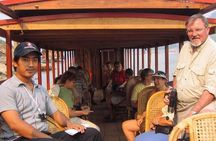 Bike to Pak Ou Caves and boat trip back to Luang Prabang City full day