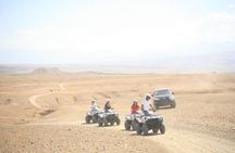 Thrilling Quad Adventure & Dinner Under the Agafay Desert Stars .