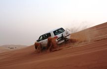 Morning Desert Safari: Dune Bashing, Sand boarding & Camel Ride