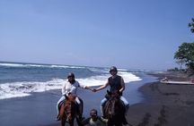 Riding a Horse to Enjoy the Extremely Black Sand Beach