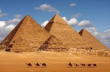 Camel Ride around the Pyramids During Sunrise Or Sunset