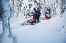 Lappish Lunch Break -Snowmobiling, ice fishing and tasty food
