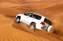Golden Dunes & Sunset Safari with BBQ, Camel Ride & Sandboarding
